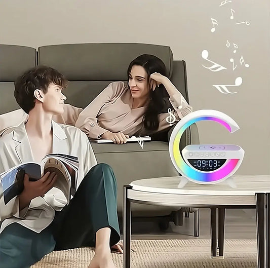 Boxă portabilă 4-în-1 LED multicoloră — ceas digital, radio FM, microfon și încărcare wireless