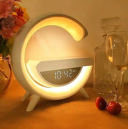 Boxă portabilă 4-în-1 LED multicoloră — ceas digital, radio FM, microfon și încărcare wireless