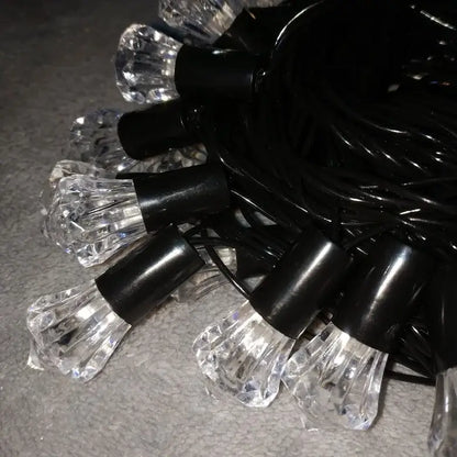 Instalație Crăciun liniară 10 m / 40 LED-uri – multicolor, fir negru, model Diamante, interior/exterior